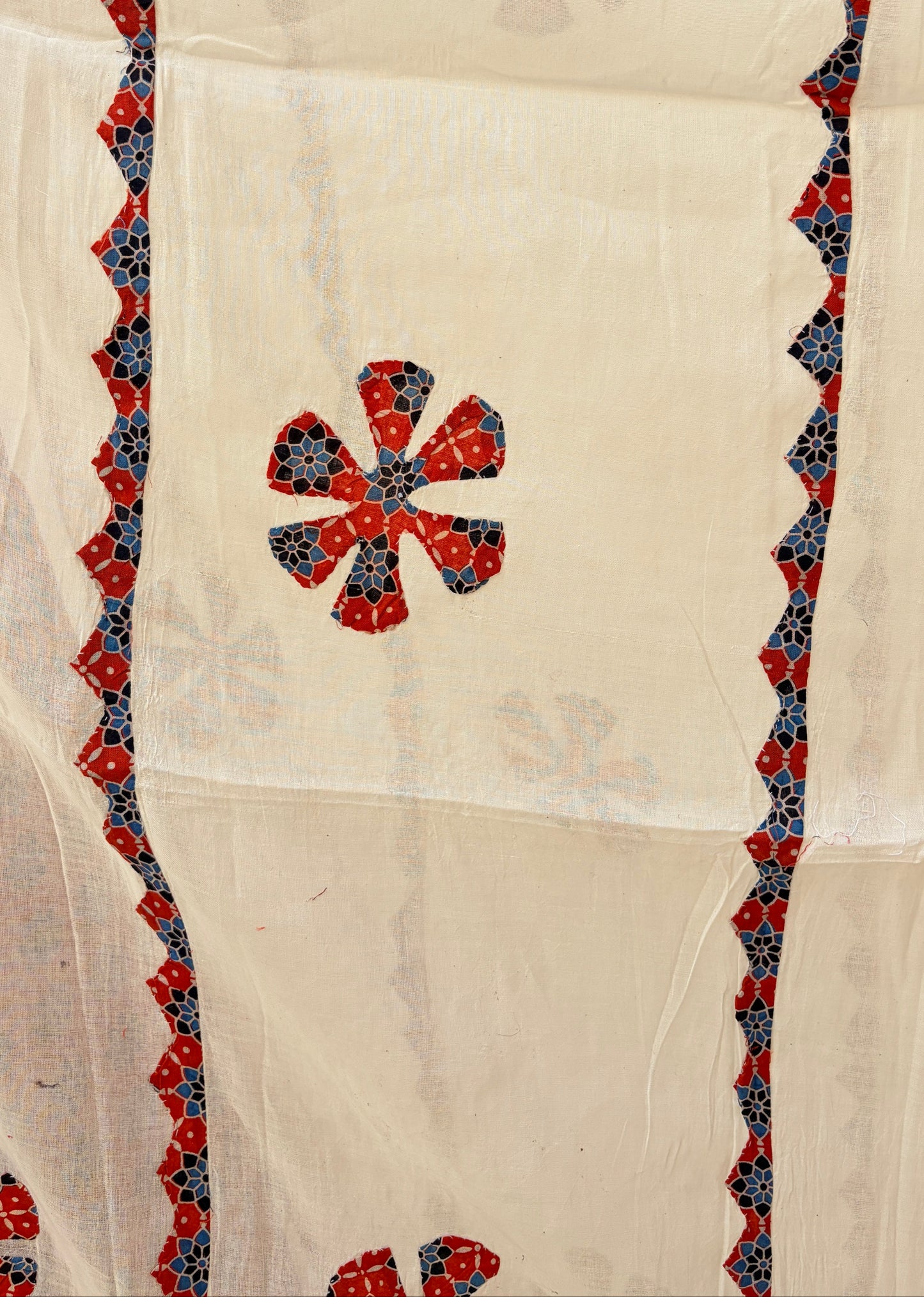 Orange Ajrakh Cotton Suit with Barmer Applique work dupatta